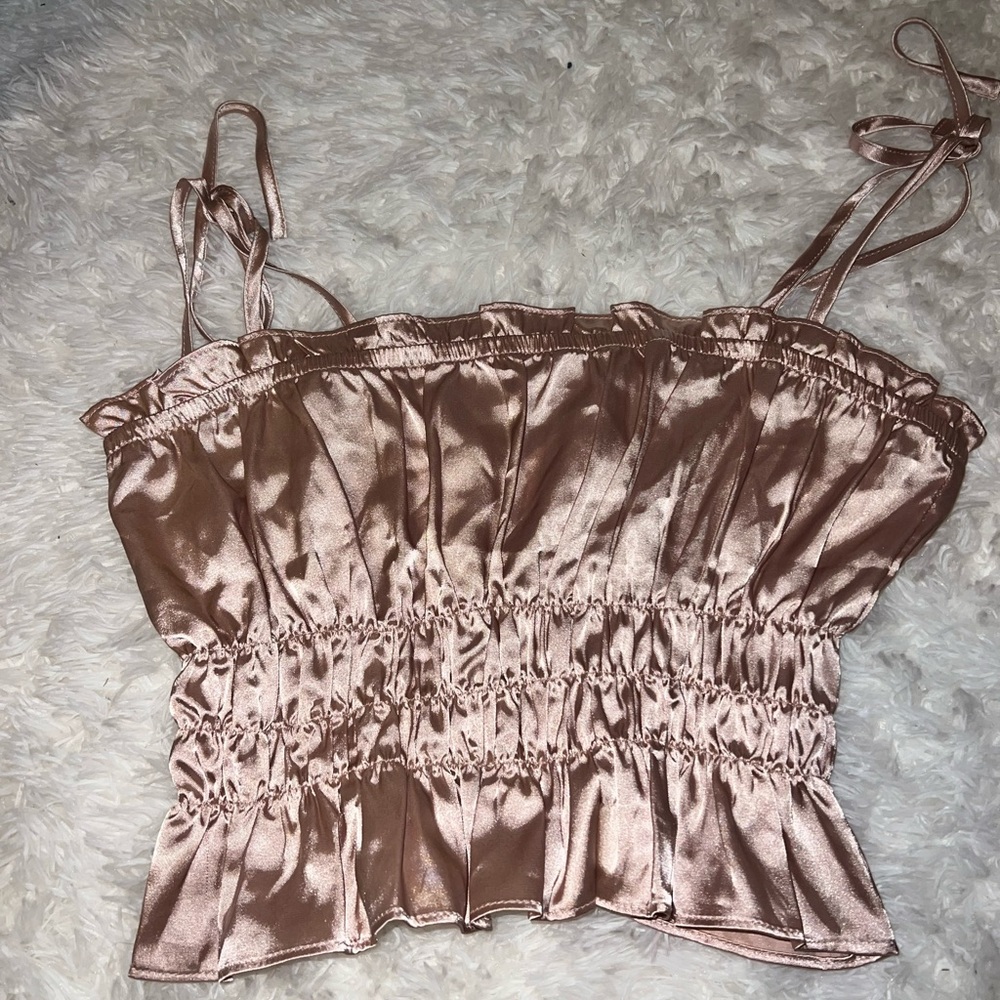 Tilly’s rose gold top
